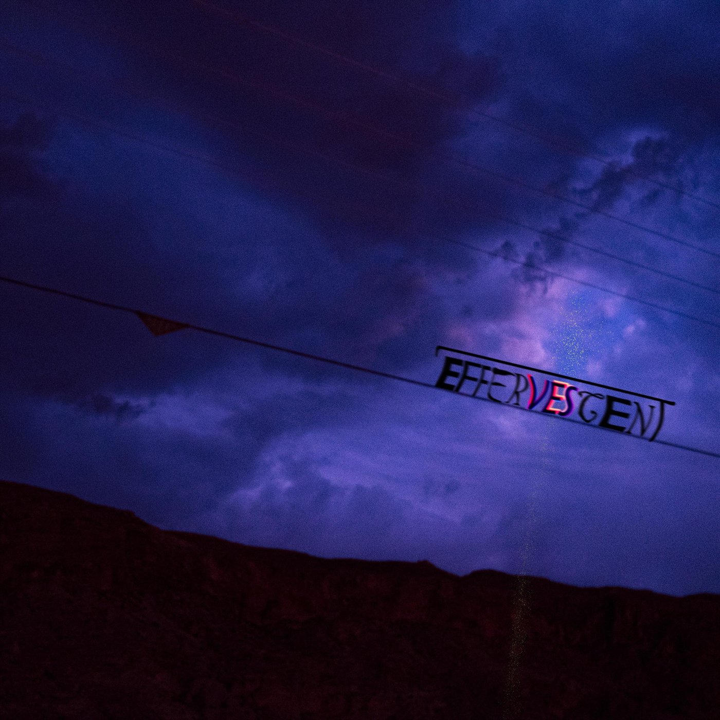 Effervescent artwork: typography on a powerline under a purple sky
